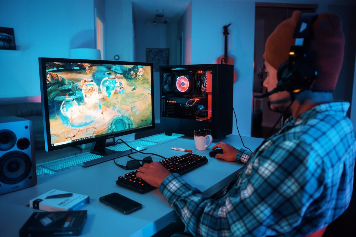 Streamer playing game with headset